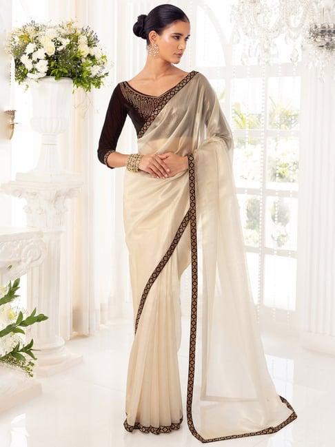 soch golden solid saree with unstitched blouse