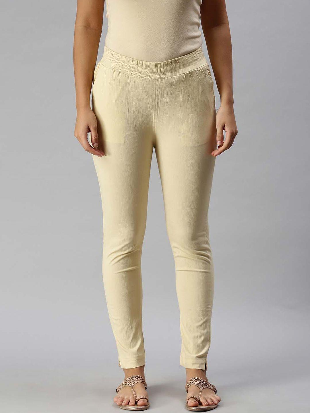 soch women beige solid crepe regular trousers