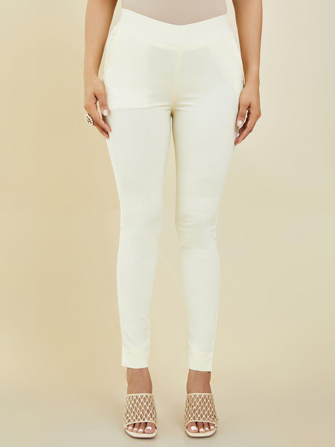soch women cream-coloured solid crepe regular trousers