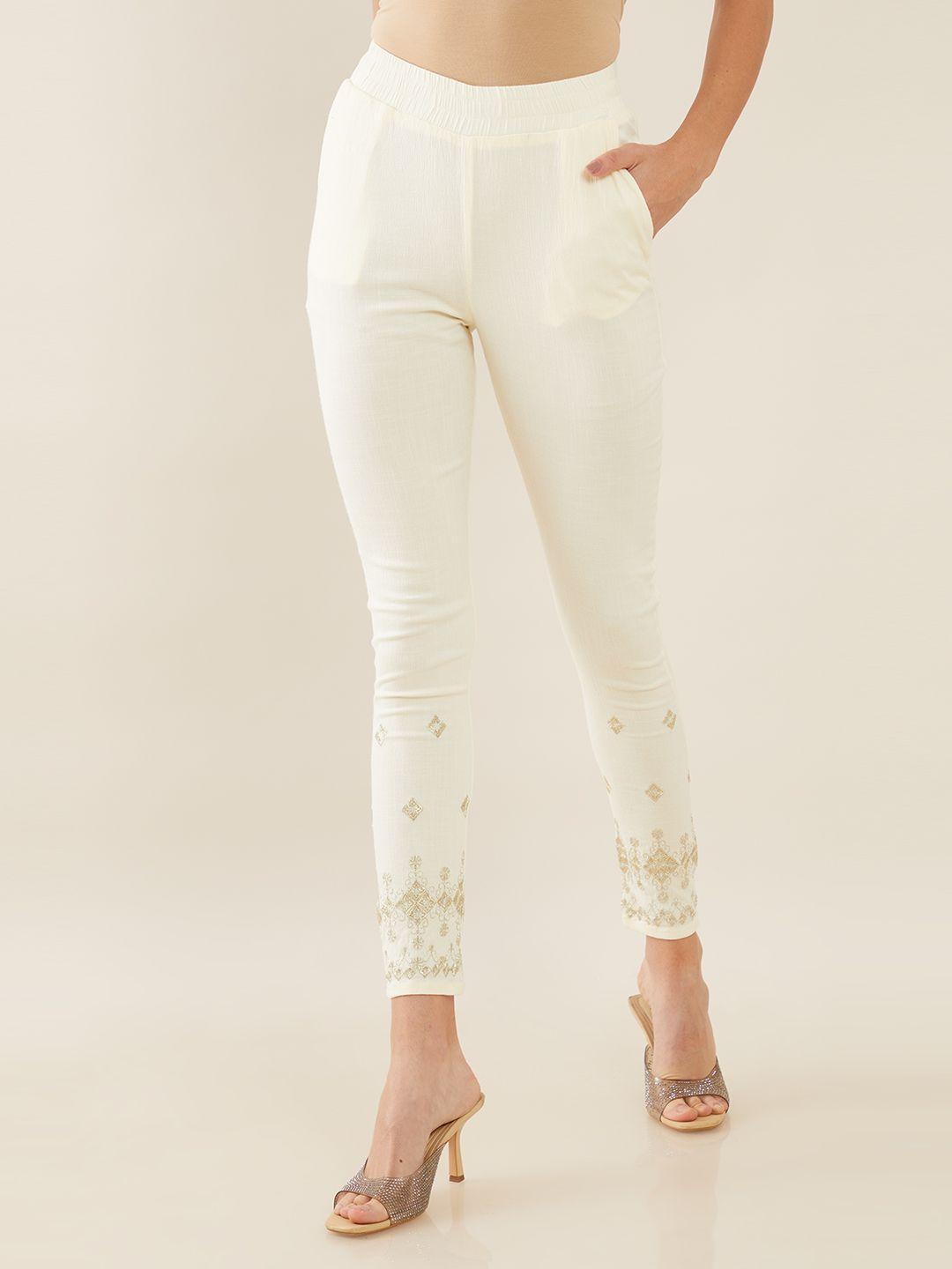 soch women off white floral embroidered relaxed skinny fit trousers