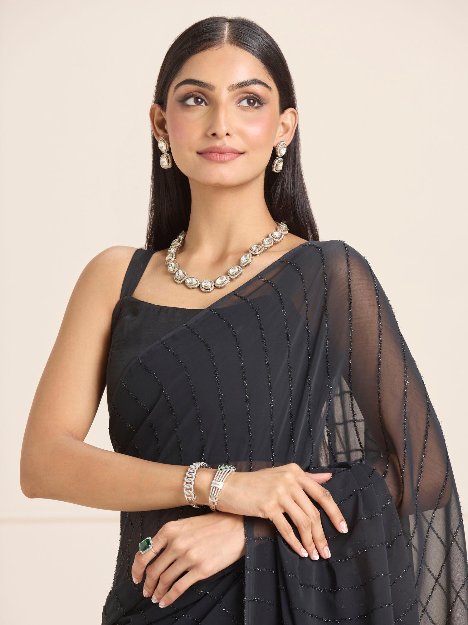 soft georgette black tone on tone vertical stripes embellished saree with unstitched blouse