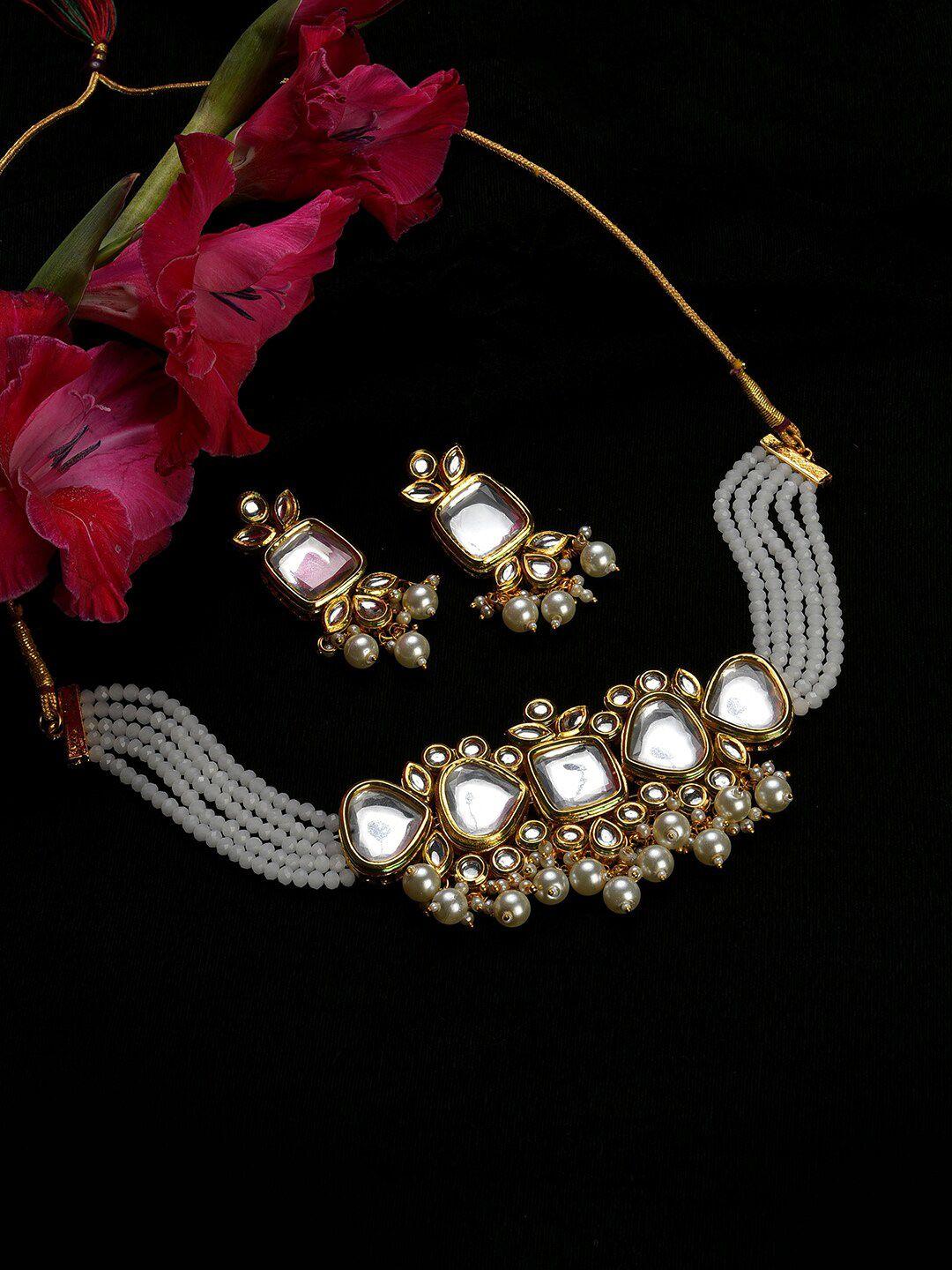 sohi gold-plated white kundan-studded jewellery set