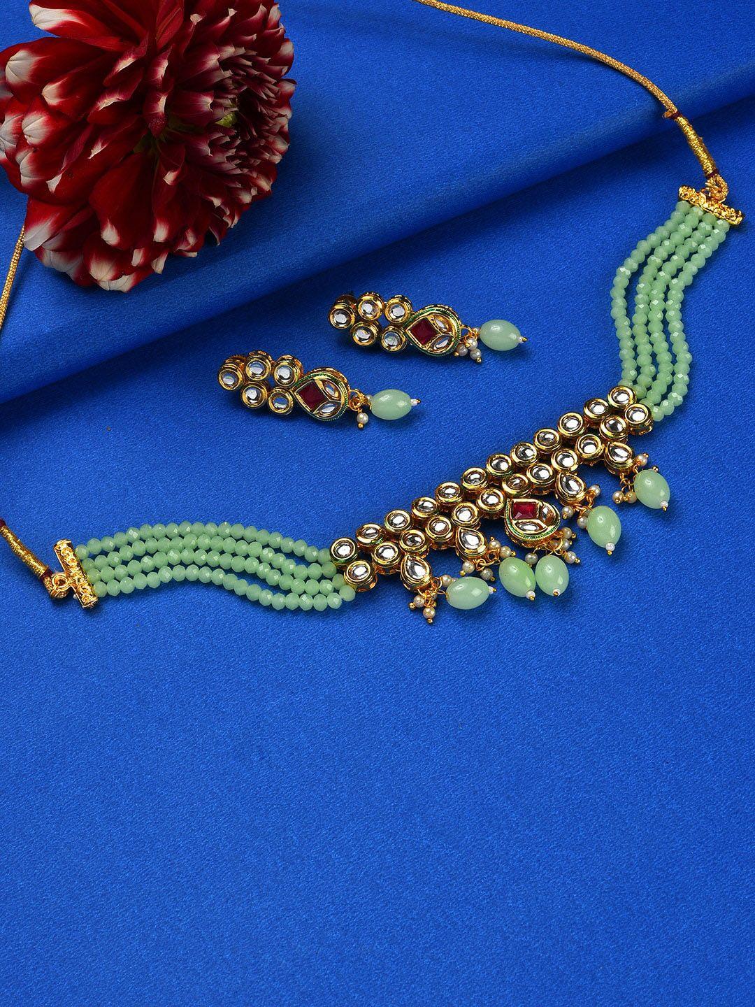 sohi gold plated kundan studded & pearl beaded jewellery set