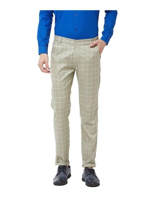 sojanya dark pista green & off white checks trousers