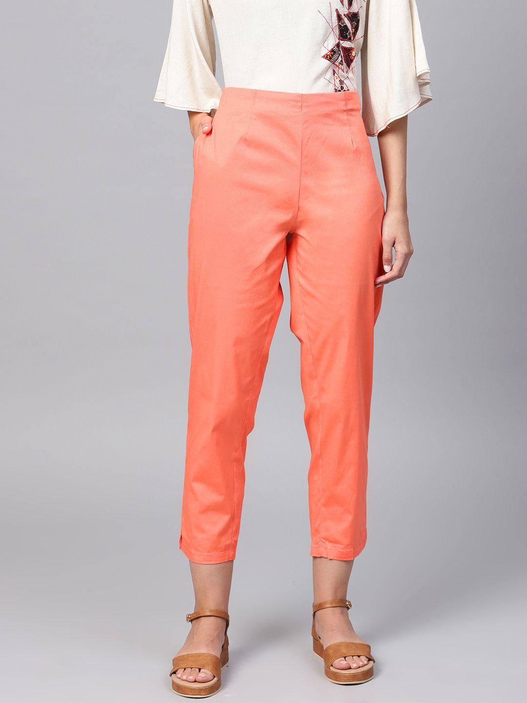 sojanya women peach-coloured slim fit solid cropped trousers