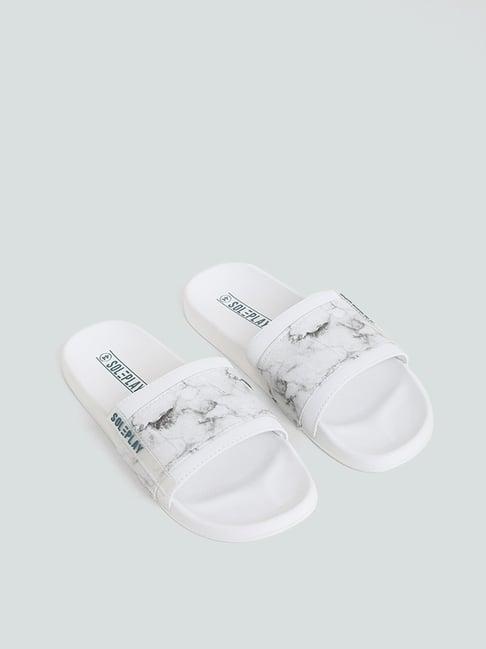 soleplay by westside white & grey marble effect printed knitted slides