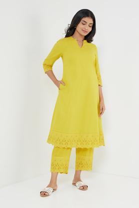 solid blended round neck women's kurti - yellow