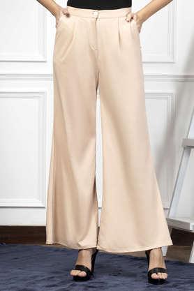 solid flared fit polyester women's casual wear trouser - peach