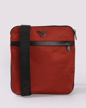 solid pattern messenger bag with eagle logo