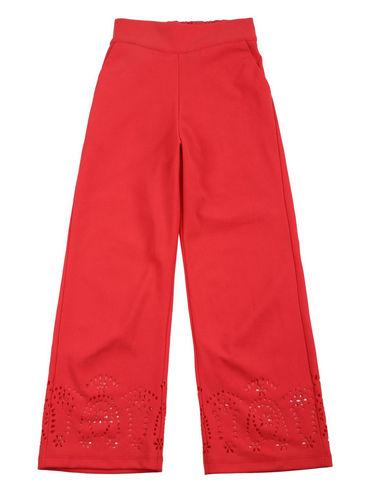 solid red trousers