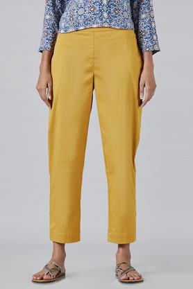 solid regular fit cotton lycra womens casual pants - mustard