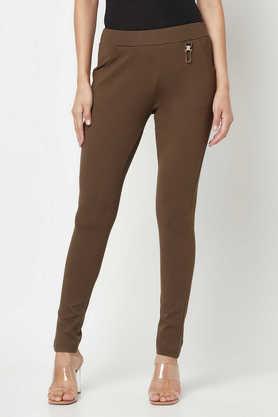 solid slim fit blended women's casual wear trouser - brown