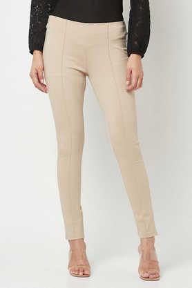 solid slim fit blended women's casual wear trouser - fawn