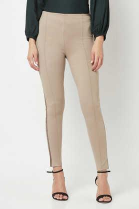 solid slim fit blended women's casual wear trouser - natural