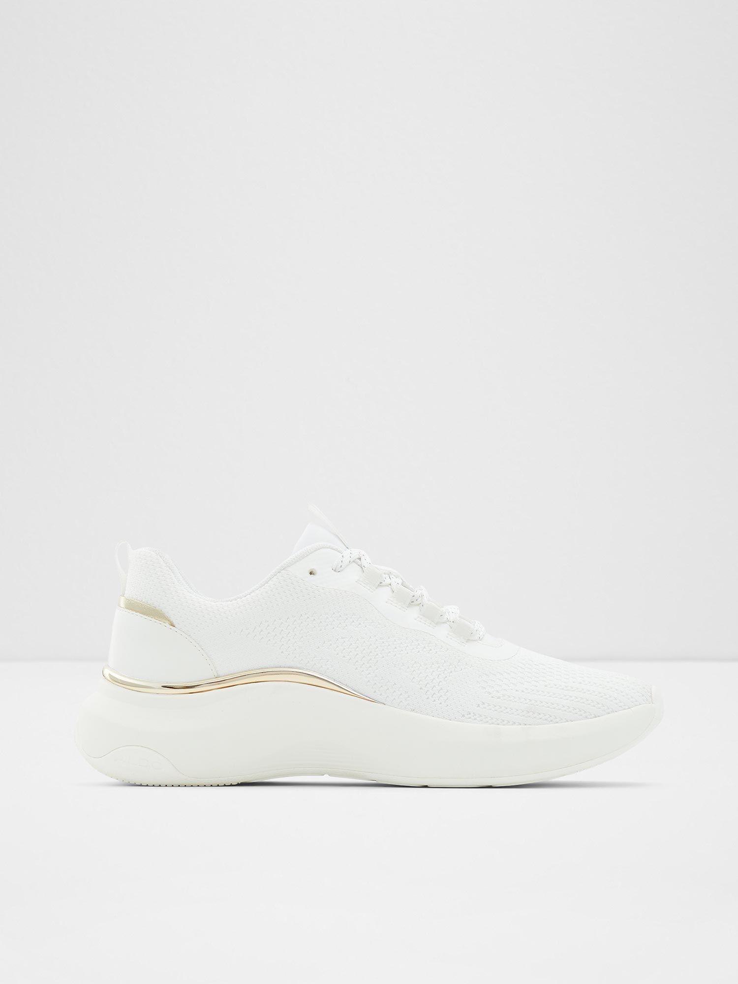 solid white sneakers