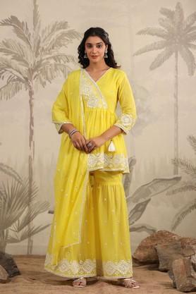 solid above knee cotton woven women's kurta set - yellow