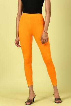 solid ankle length blended fabric women's leggings - orange