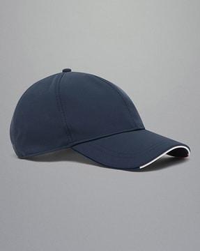 solid baseball cap with embroidered shark in brand colours