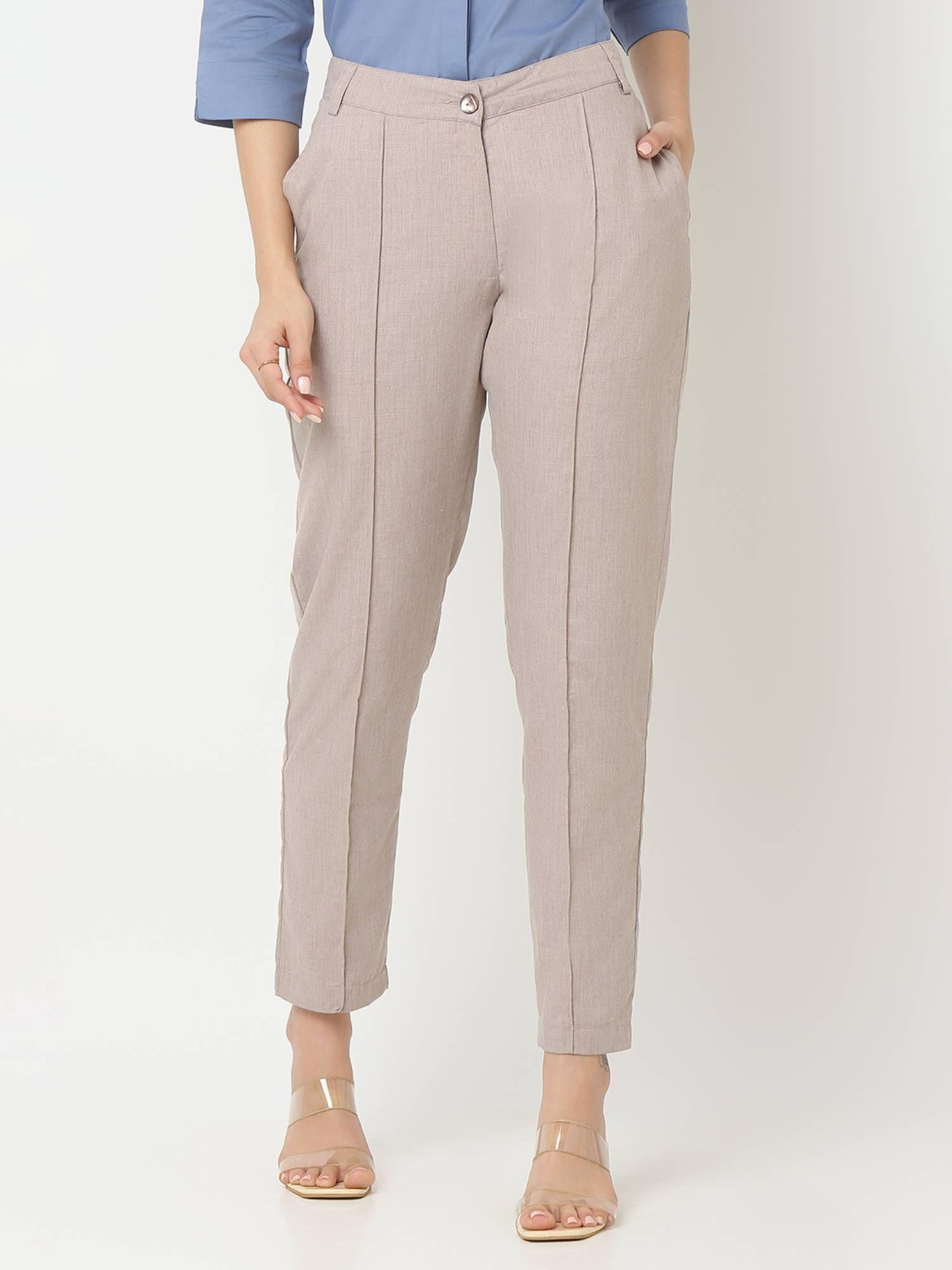 solid beige pleat detailing on the front trouser