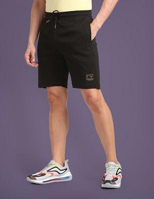 solid cotton blend mid rise shorts