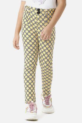 solid cotton regular fit girls track pants - yellow