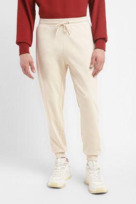 solid cotton regular fit men's track pants - natural