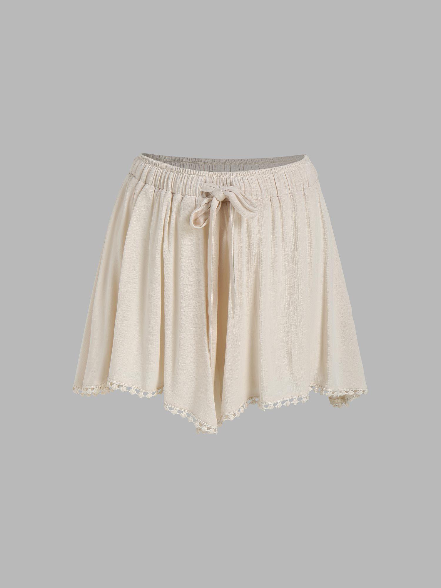 solid elastic waist knotted midi shorts