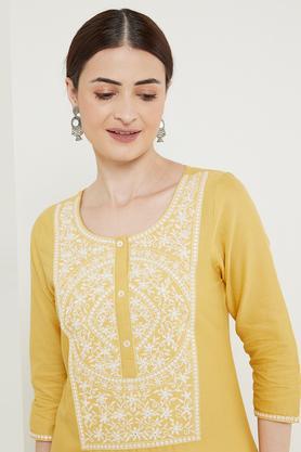 solid flex round neck women's kurta - mustard