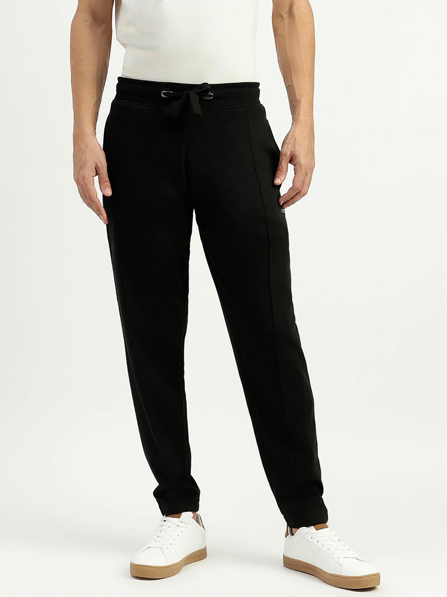 solid mid rise regular fit track pants black