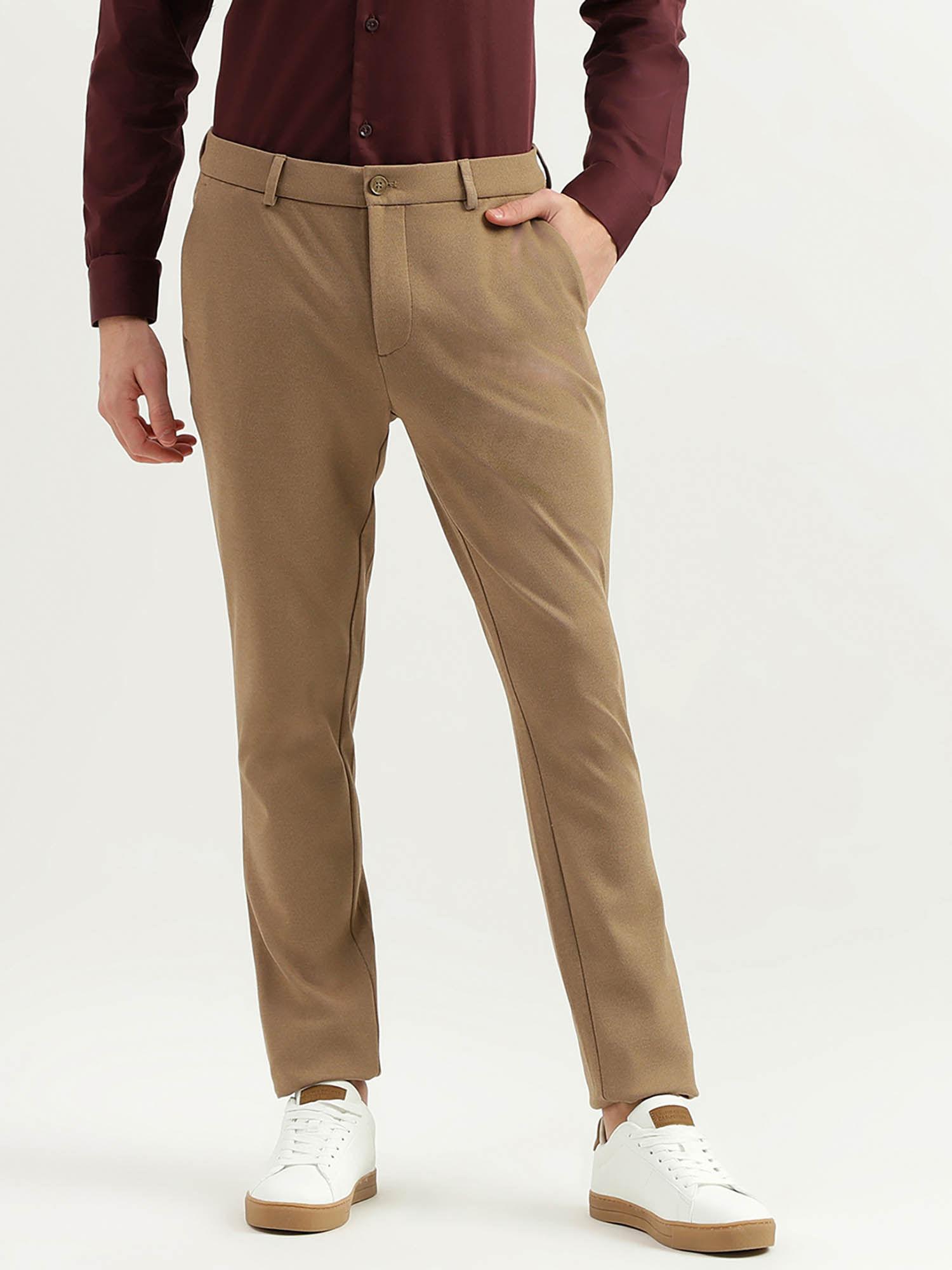 solid mid rise slim fit trousers khaki