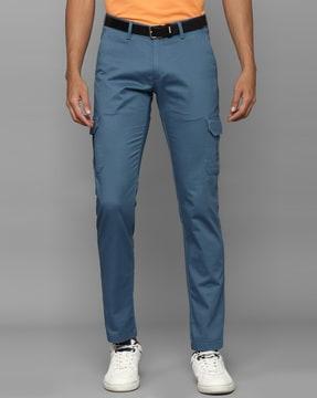 solid mid rise slim fit trousers