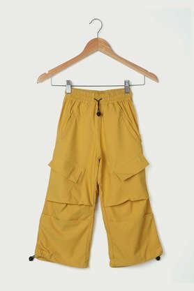 solid polyester regular fit girls trousers - mustard