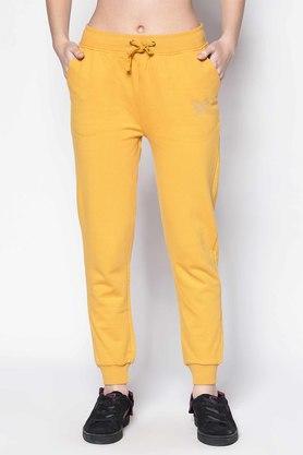 solid regular fit cotton womens casual track pants - yellow