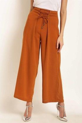 solid regular fit polyester women's casual wear trousers - mustard