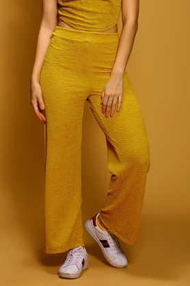 solid regular fit polyester women's casual wear trousers - yellow
