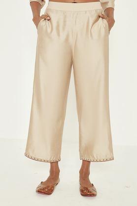 solid regular fit viscose women's casual wear trousers - natural