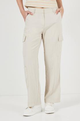 solid relaxed fit polyester women's casual wear pants - cream