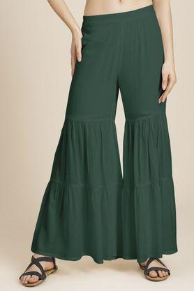 solid relaxed fit rayon women's casual wear trousers - green