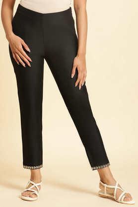 solid slim fit blended fabric women's festive wear pant - black