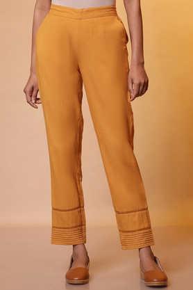 solid slim fit cortton blend women's casual wear trousers - yellow
