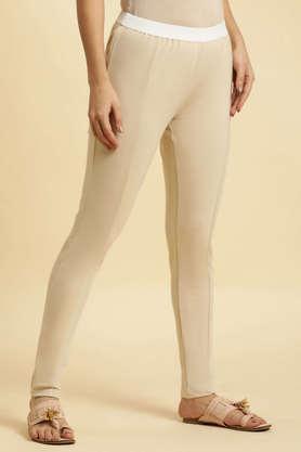 solid slim fit viscose women's casual wear pant - natural