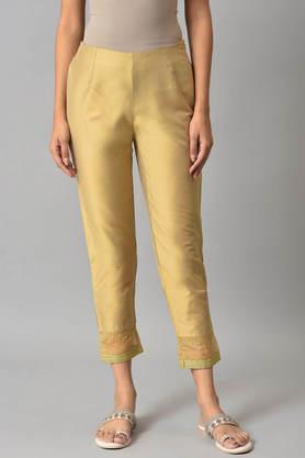 solid slim fit viscose women's festive wear pant - gold