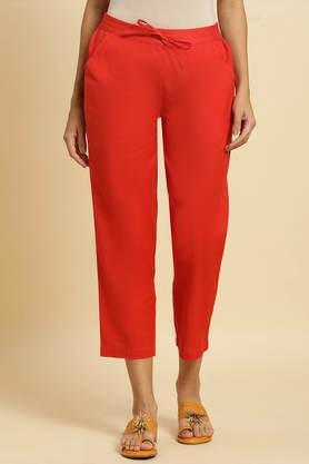 solid straight fit blended fabric women's festive wear pant - orange