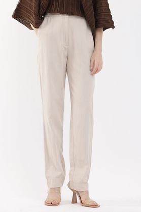 solid tapered fit cotton blend women's casual wear trousers - natural