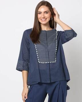 solid top with button details