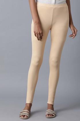 solid viscose blend skinny fit women's leggings - gold