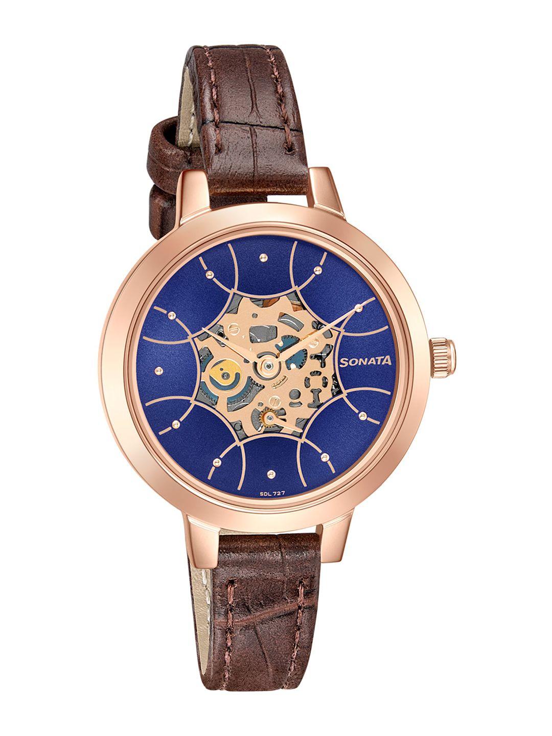 sonata women blue brass skeleton dial & brown leather strap analogue watch 8141wl08