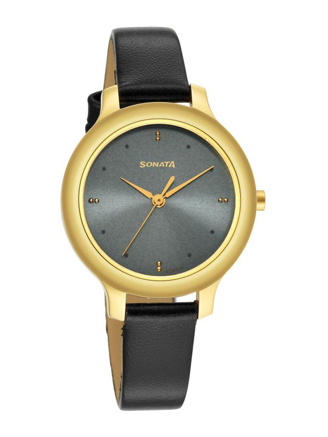 sonata women gold-toned brass embellished dial & black leather straps analogue watch