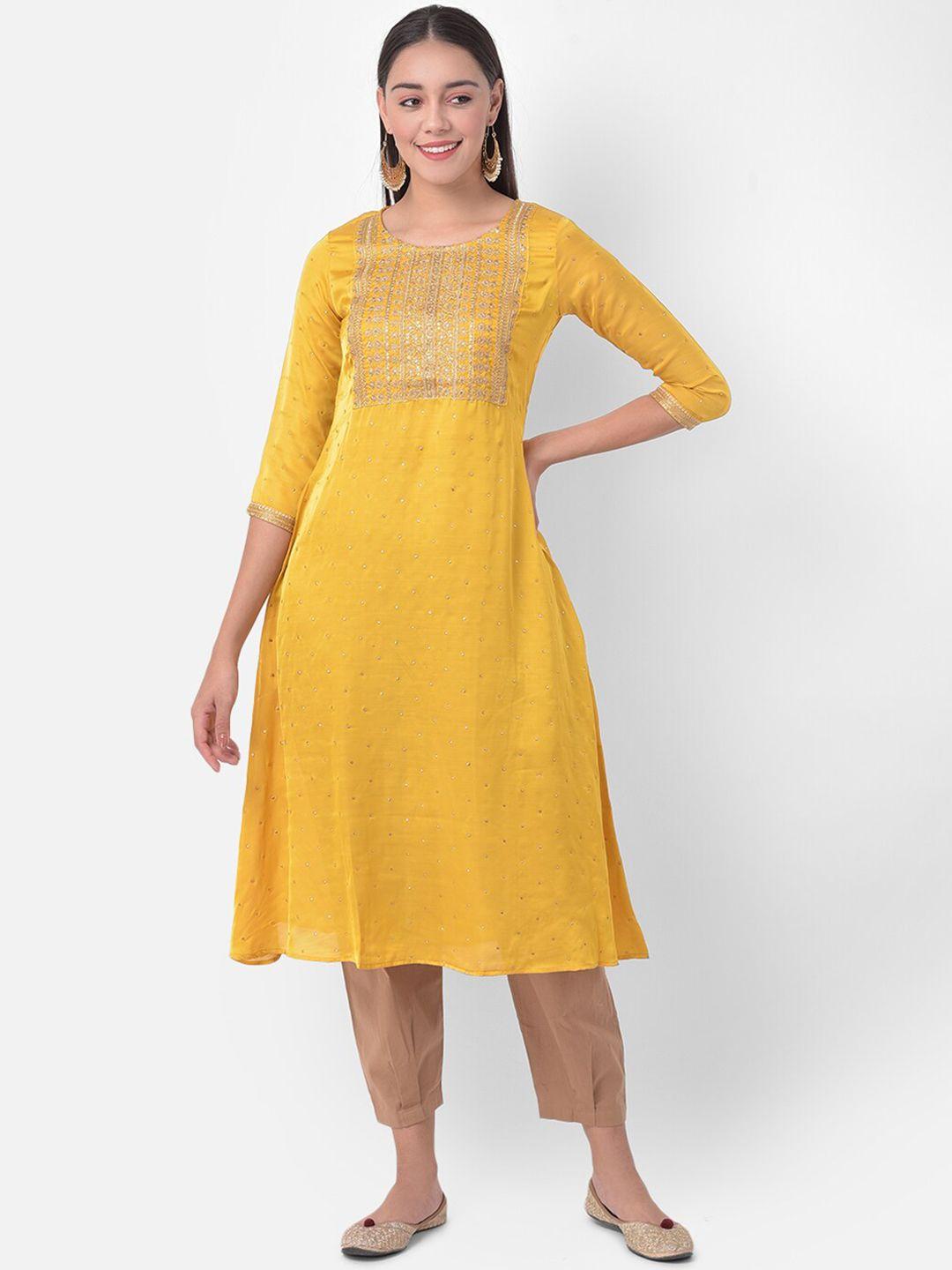 span women yellow ethnic motifs yoke design kurta