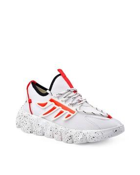 sports shoes with lace fastening